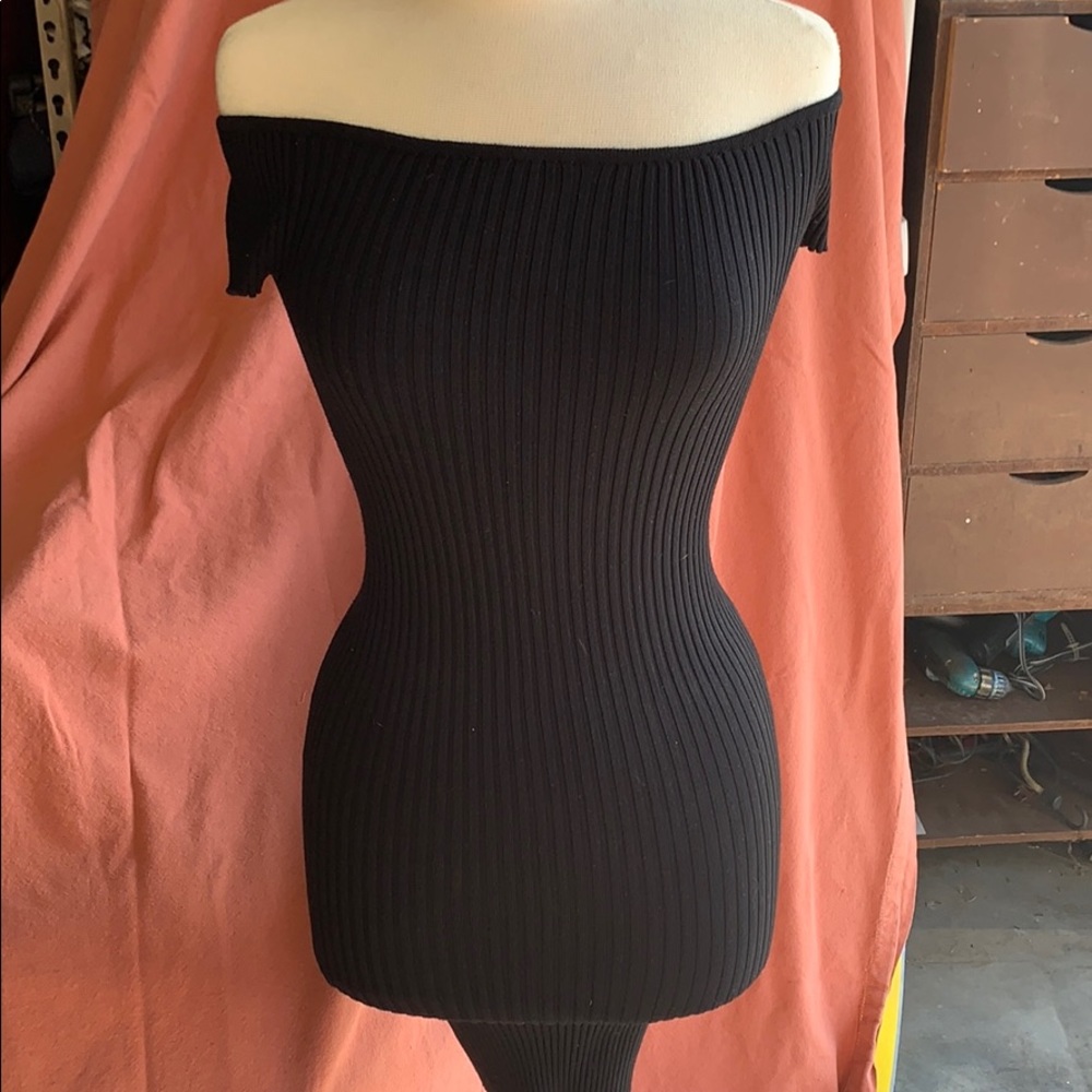 black dress off the shoulder, snug fit